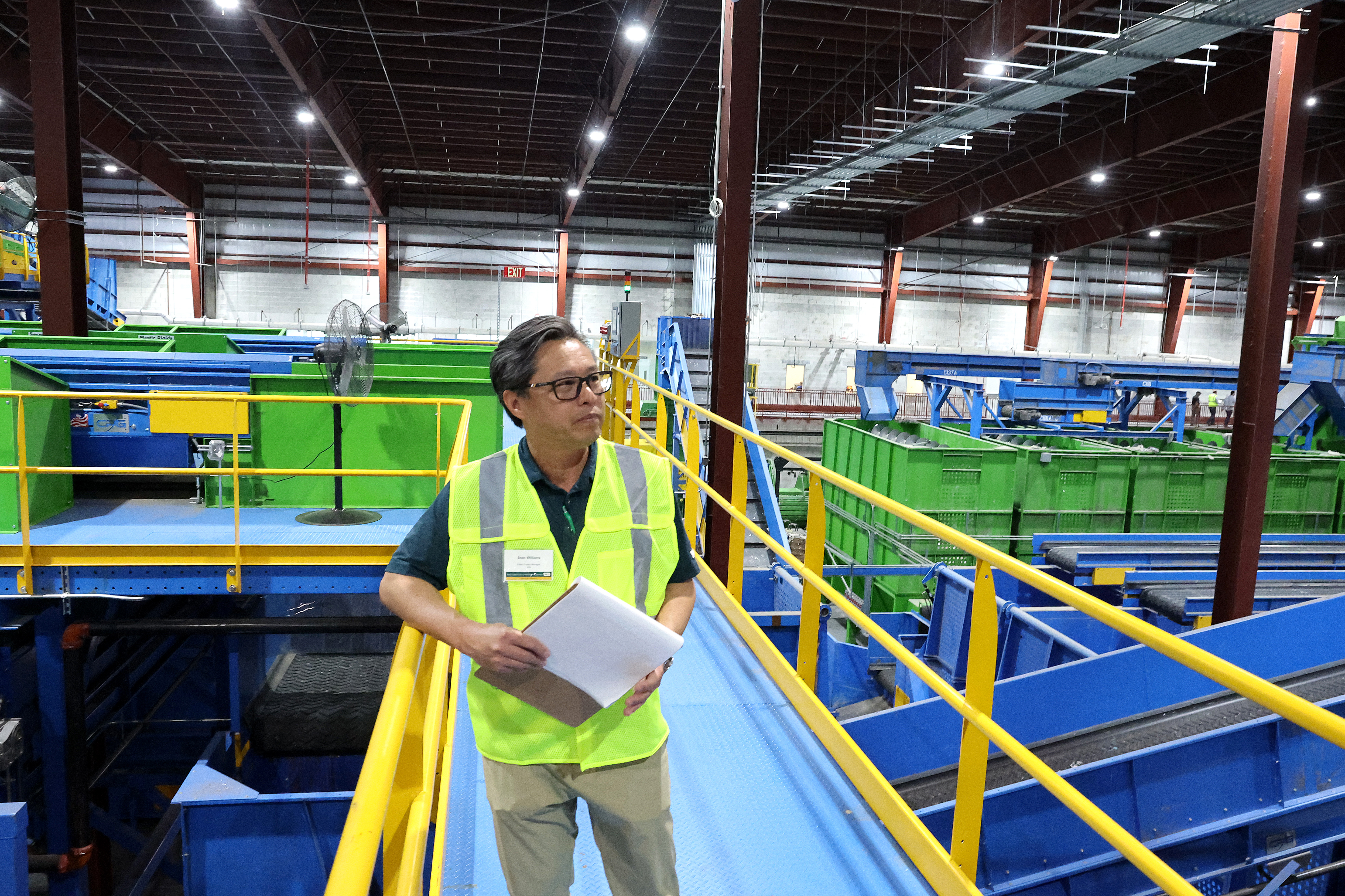 Sean Williams, sales and project manager with Waste Management, leads...