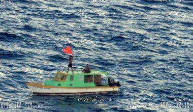 Air Force and Navy rescue men on small boat 200km from Tonga