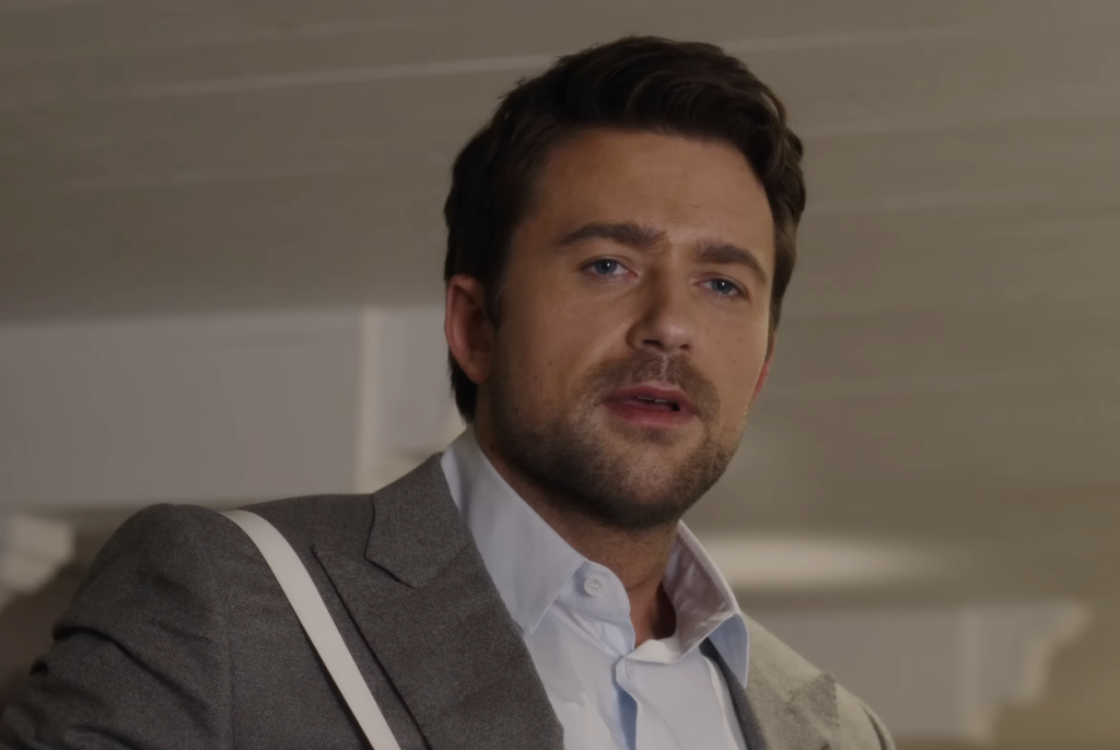 Brandon Sklenar looking in surprise in The Housemaid.