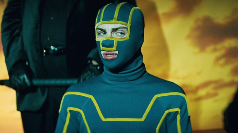 Kick-Ass looking scared in a chair in Kick-Ass