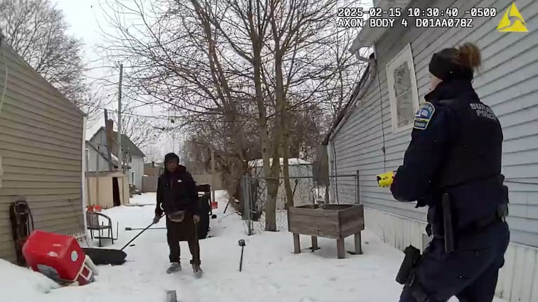 This image from body camera video provided by the Buffalo Police Department shows Nurul Amin Shah Alam, left, as he is approached by Buffalo Police officers in Buffalo