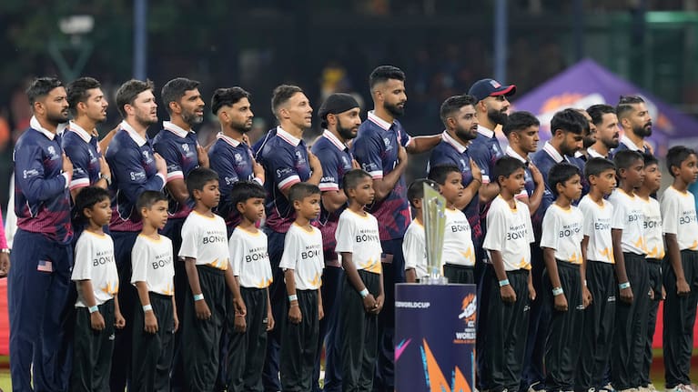 United States players stand for national anthem before the start of the T20 World Cup cricket match between Pakistan and the United States in Colombo, Sri Lanka.