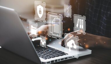 Digital icons above a computer.