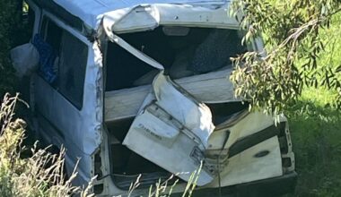 Van owner facing charges after crashing down bank