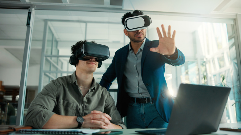 Office workers using VR headsets