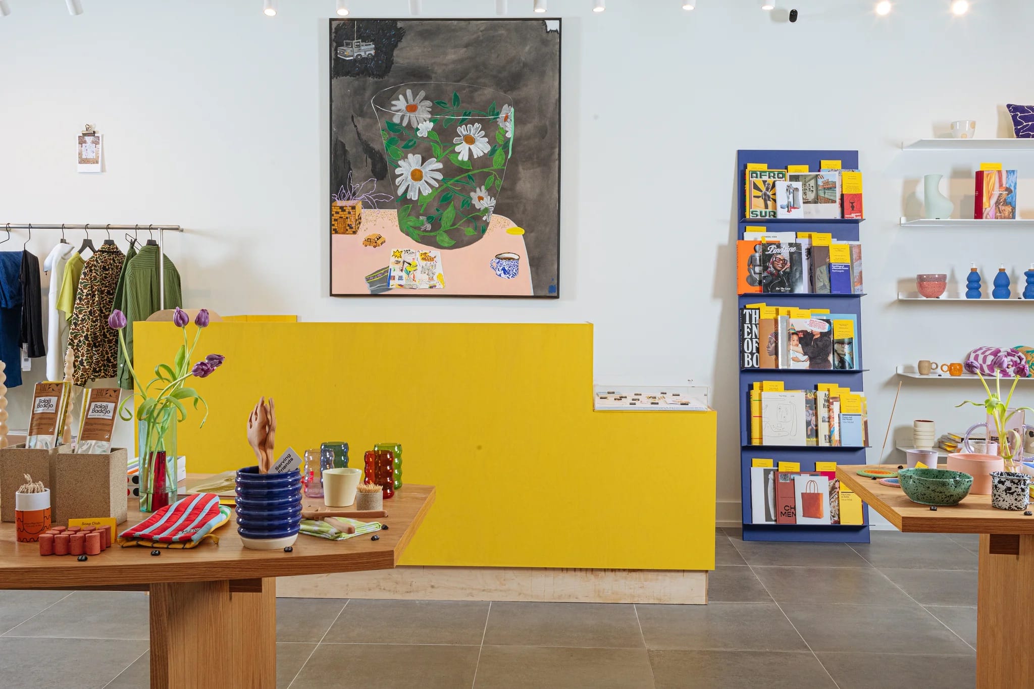 the colorful yowie gift shop with tables, books, shelving, and more