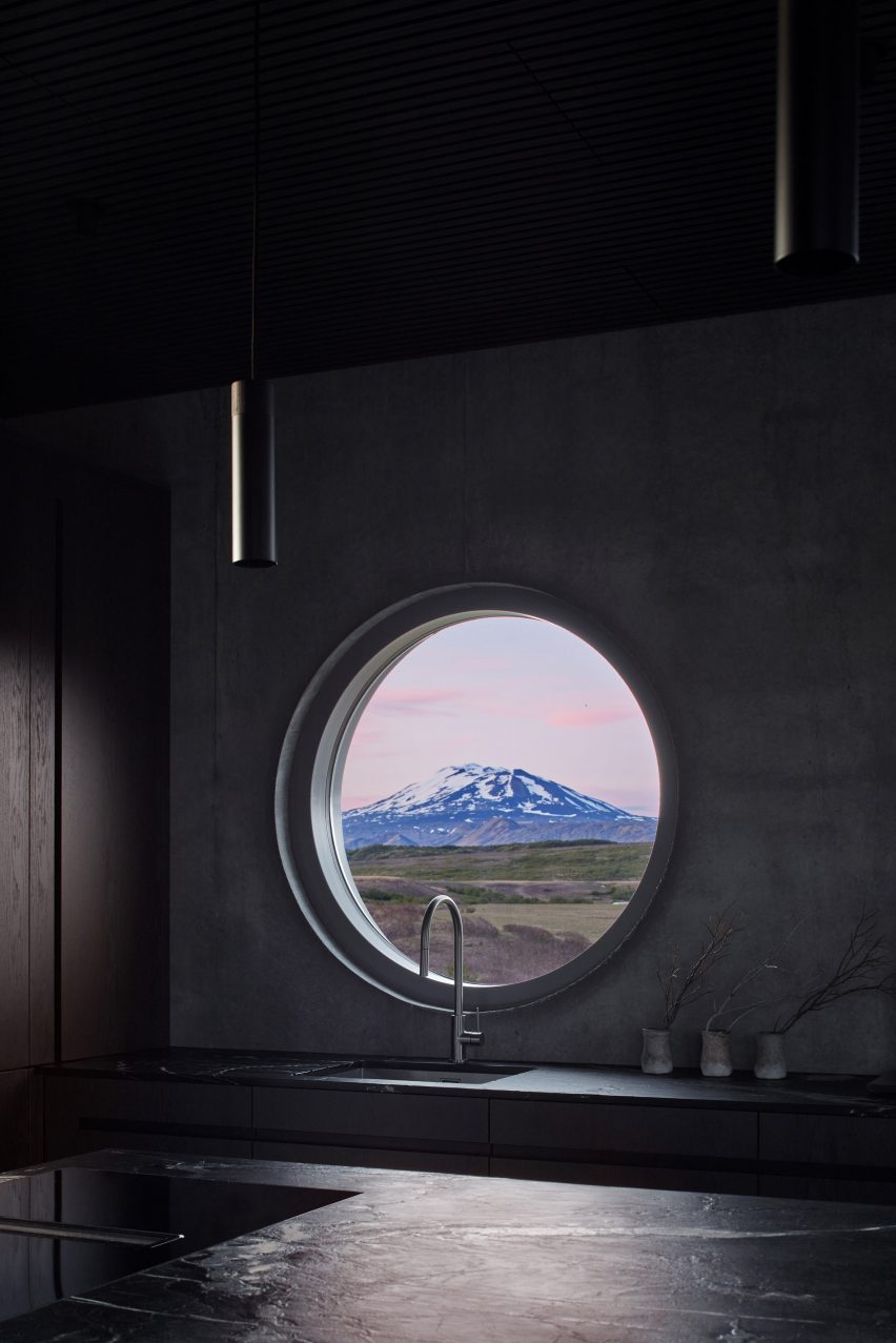 Porthole window within the Swan Nest by Yrki Arkitektar