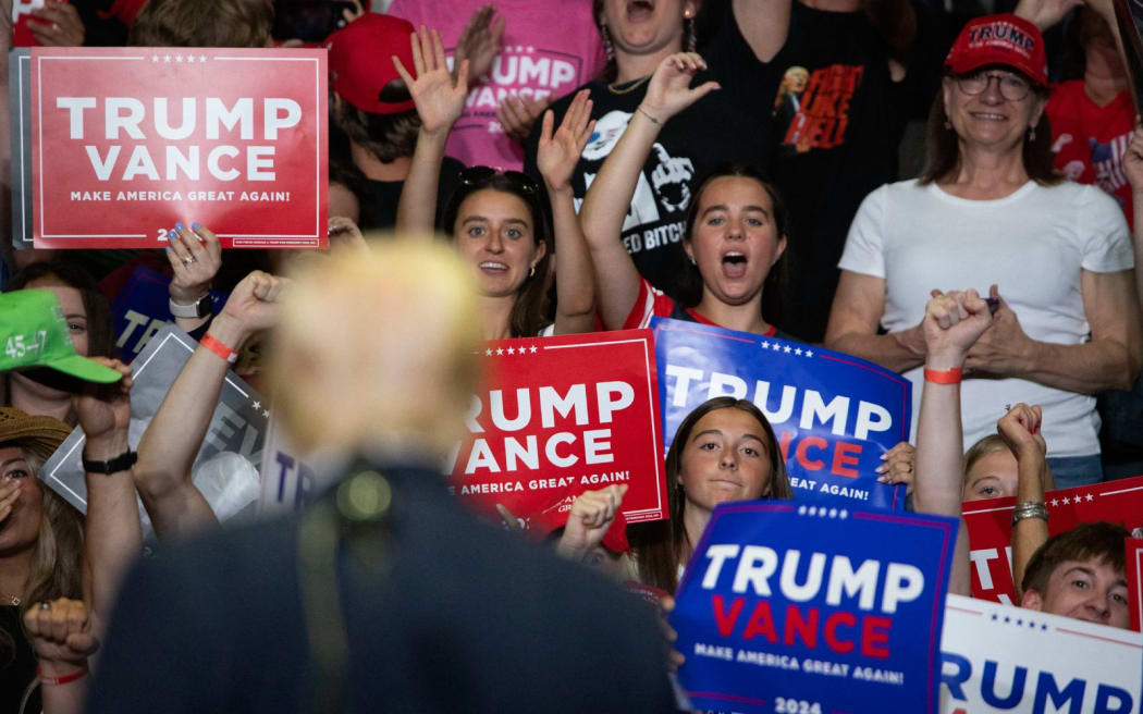 GRAND RAPIDS, MICHIGAN - JULY 20: Republican Presidential nominee former President Donald J. Trump holds his first public campaign rally with his running mate, Vice Presidential nominee U.S. Senator J.D. Vance (R-OH) (not pictured), at the Van Andel Arena on July 20, 2024 in Grand Rapids, Michigan. This is also Trump's first public rally since he was shot in the ear during an assassination attempt in Pennsylvania on July 13. Photo by Bill Pugliano/Getty Images) (Photo by BILL PUGLIANO / GETTY IMAGES NORTH AMERICA / Getty Images via AFP)