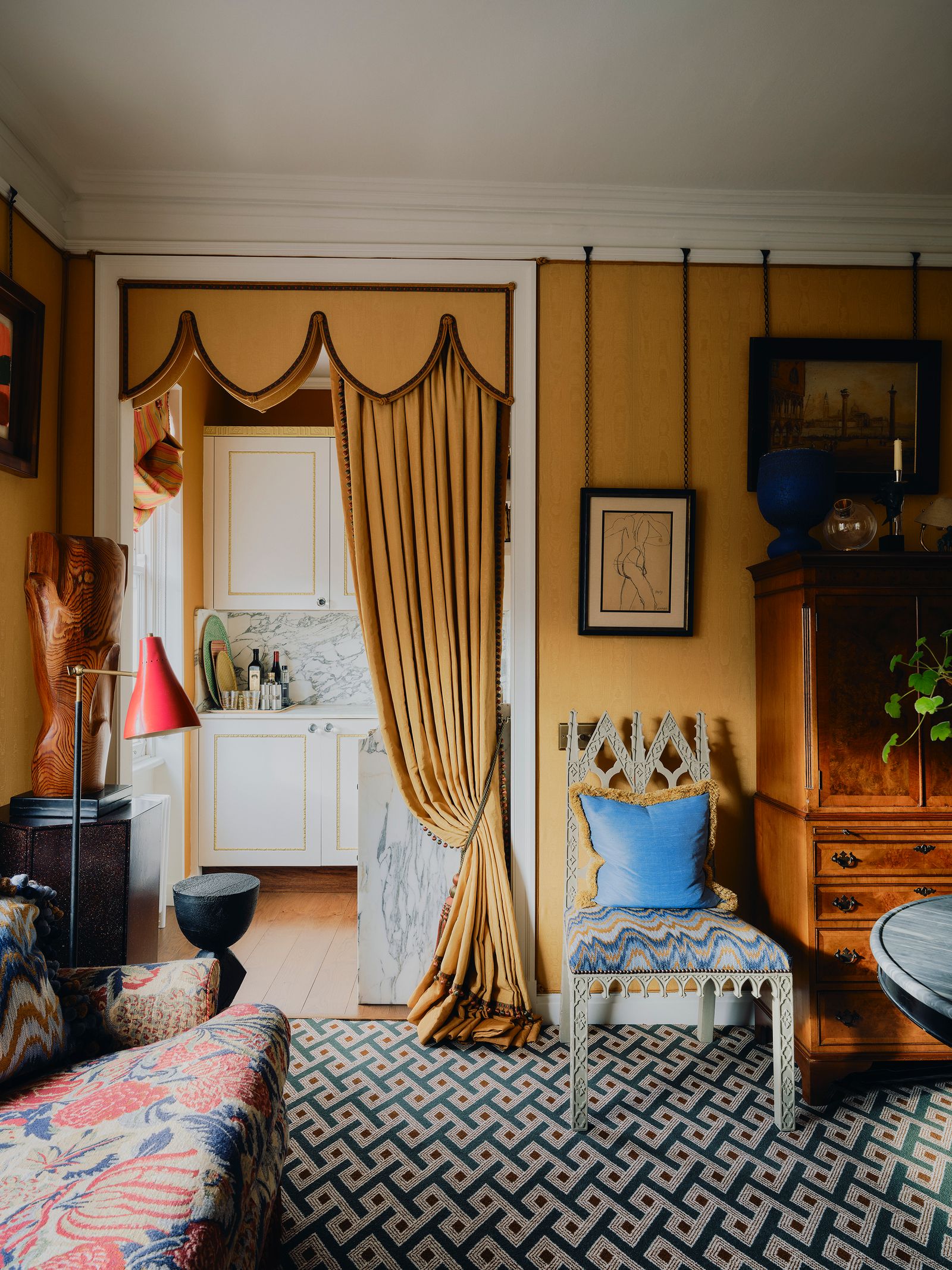 Image may contain Home Decor Indoors Interior Design Architecture Building Furniture Living Room Room and Cushion