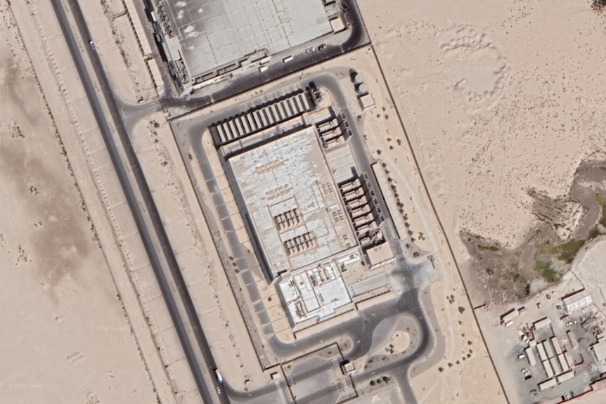 A satellite image of a data center in the desert.