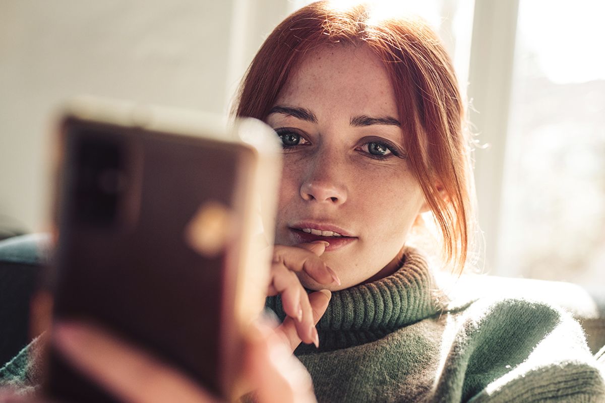 Woman looking at her phone.