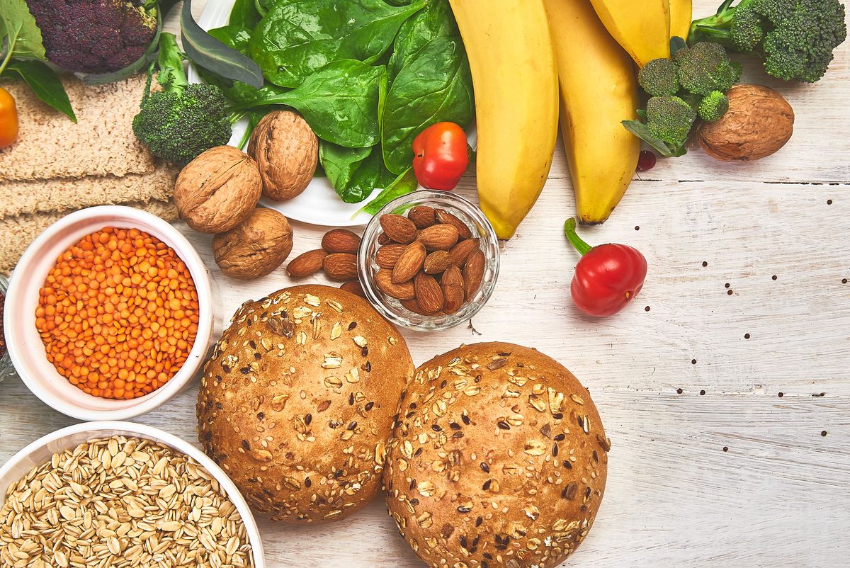 Selection food rich in fibre on white wooden background, Healthy diet food product. Top view, flat lay, copy space.