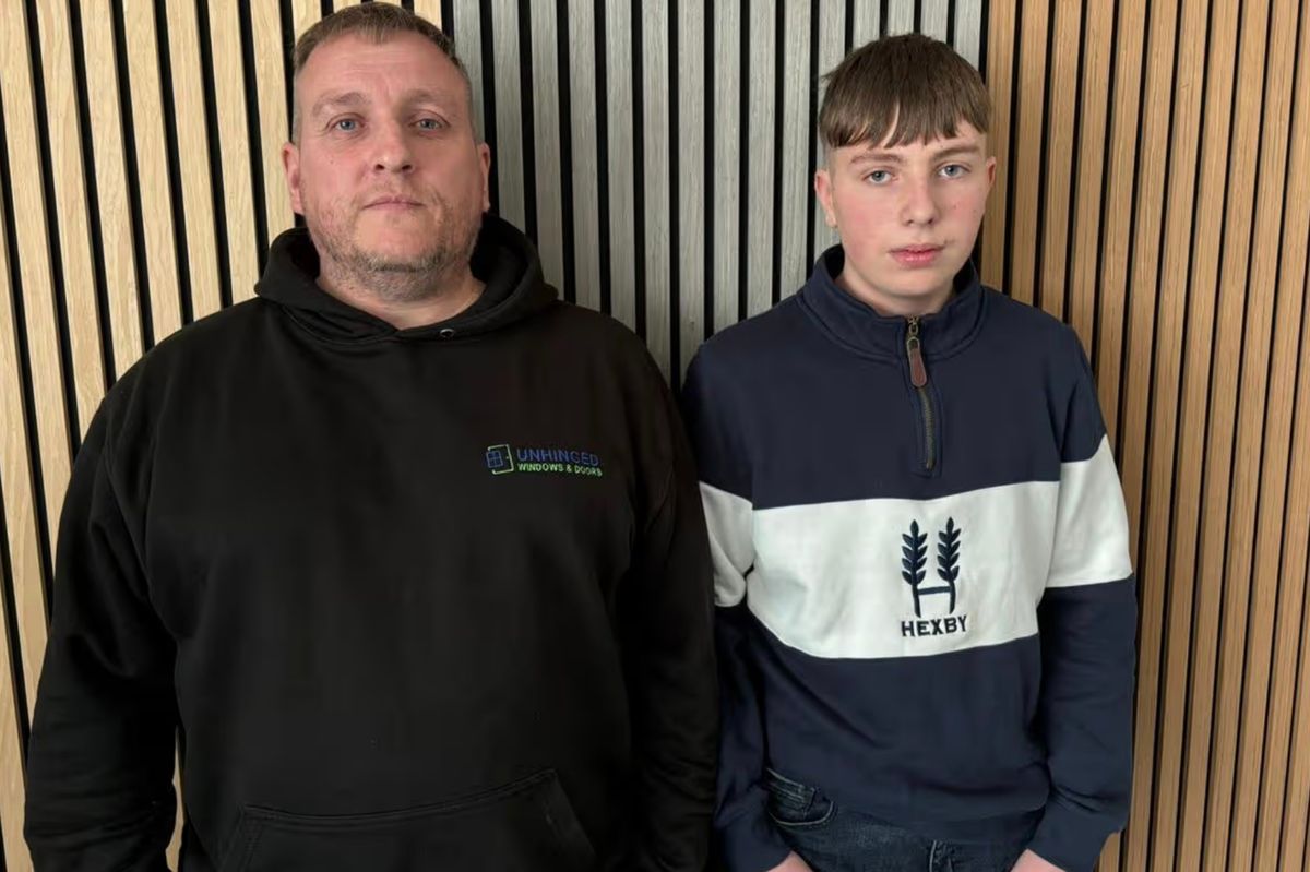 Ieuan and Dad sitting next to Dad Lee