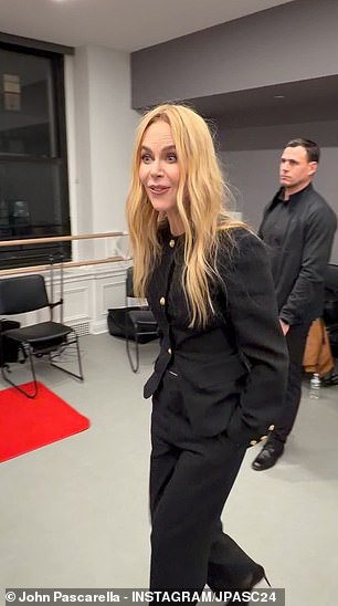 The blazer featured gold buttons down the front