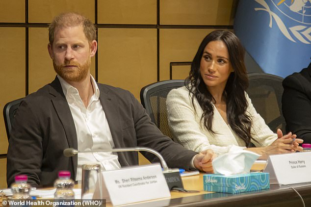 Prince Harry and Meghan Markle attend a roundtable conference in Amman on February 25