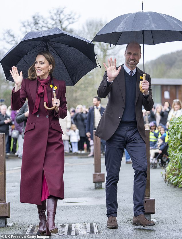 Prince William, pictured with wife Catherine in Wales on February 26, was all smiles amid the recent Royal Family crisis resulting from the arrest of his uncle Andrew Mountbatten-Windsor