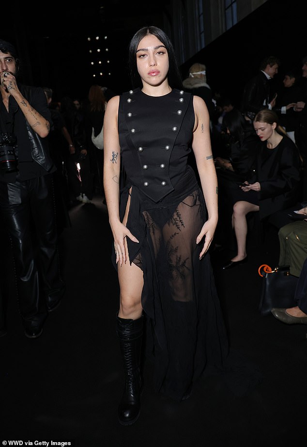 Meanwhile the racy skirt featured a thigh-high split with laced embellishments