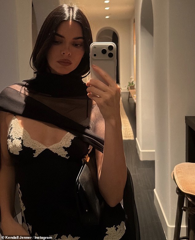 Jenner showed off her outfit in a brace of mirror selfies she took as she performed the final check on her look before stepping out for the evening