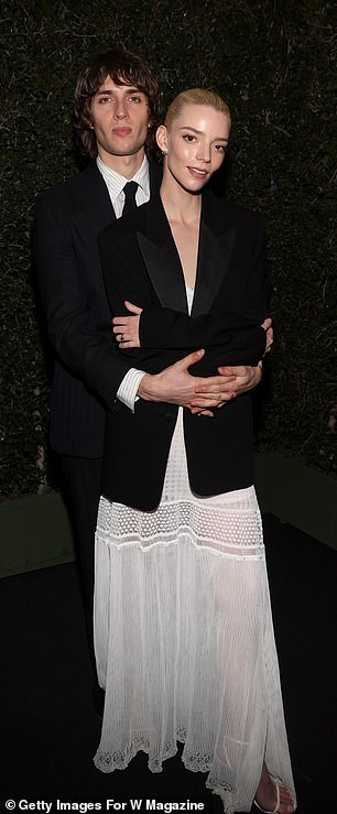 She cuddled up to her husband Malcolm McRae for a series of cosy snaps