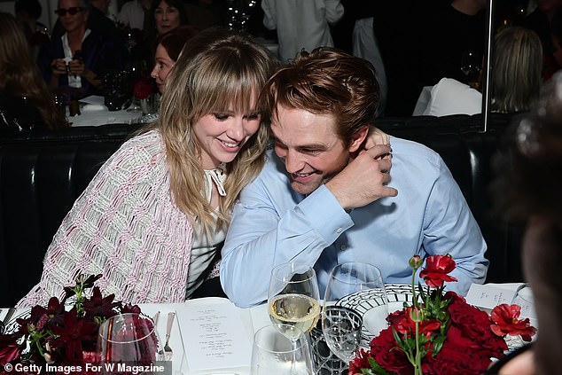 Suki Waterhouse and Robert Pattinson were seen perusing the menu inside the party