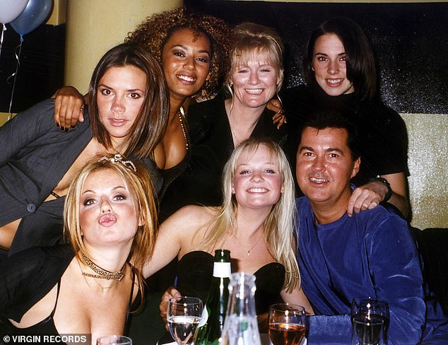 The Spice Girls with their manager Simon Fuller, and Emma Bunton’s mother, Pauline, in 1997