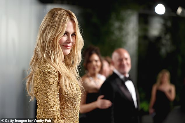 Nicole Kidman photobombed Lauren Sánchez and Jeff Bezos' red carpet moment at the 2026 Vanity Fair Oscars Party on Sunday