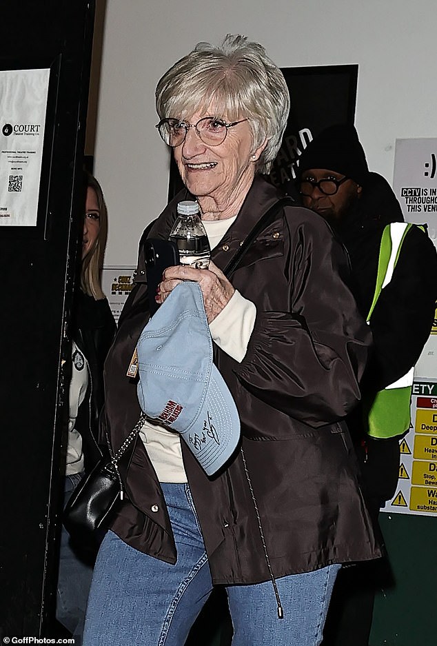 Joanne was joined at the sold-out gig with mum Sandra who was spotted holding a signed blue baseball cap