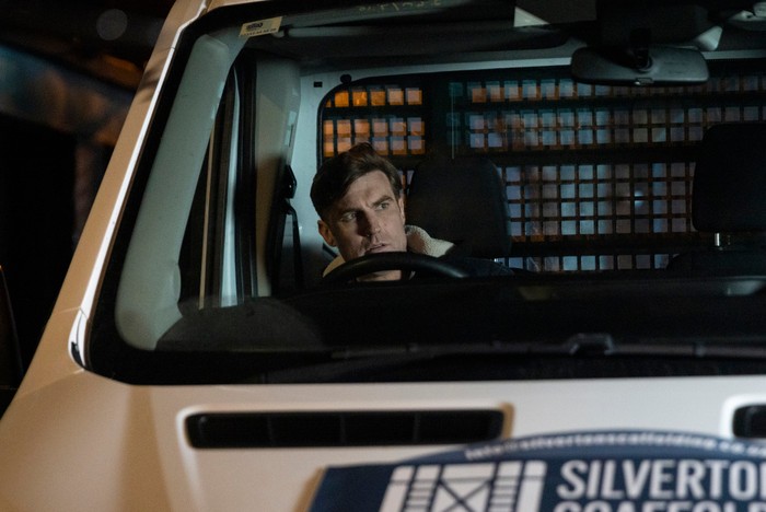 11_03_coro_todd_james_theo_04 Theo sits in his van late at night in a scene from Coronation Street