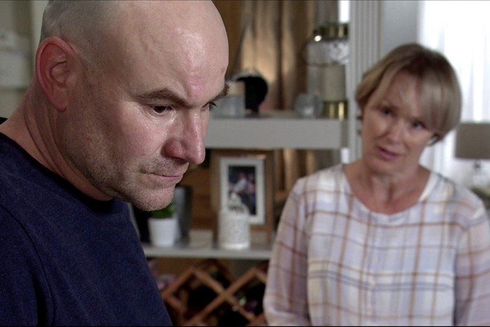 Sally looks towards a saddened Tim in a scene from Coronation Street