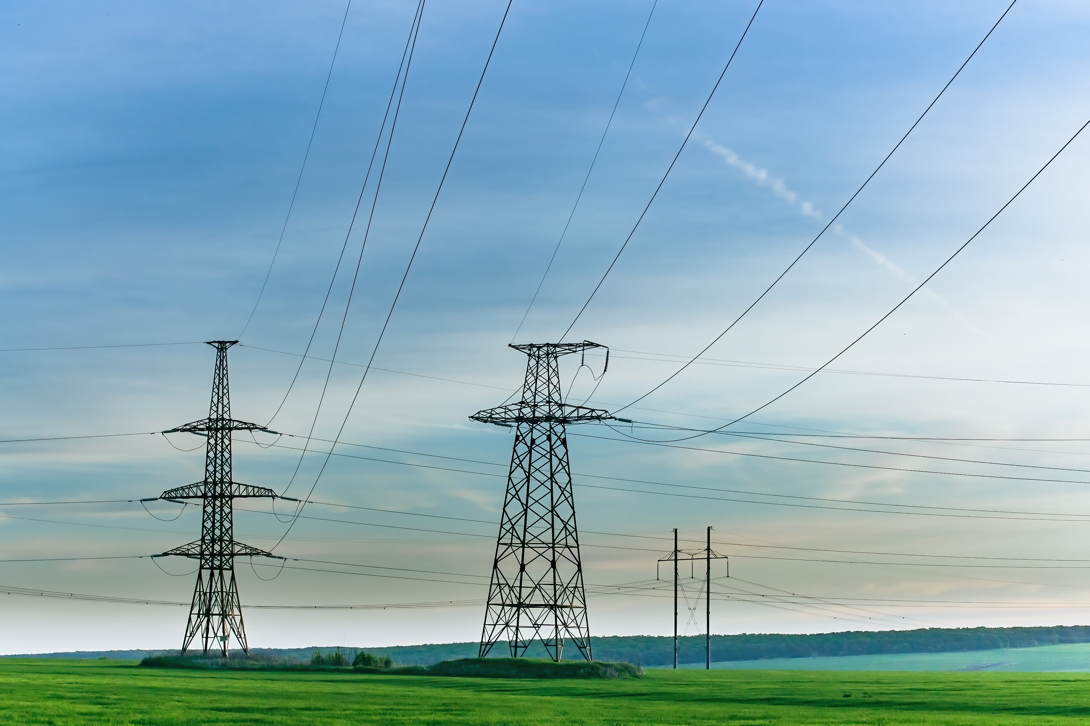 Power lines connecting utility towers.