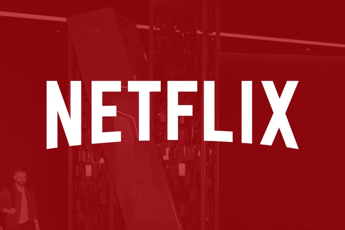 White Netflix logo on a red background.