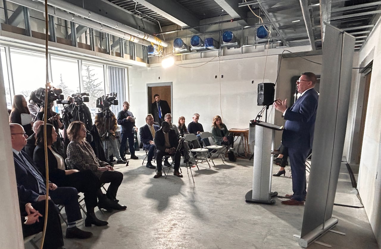 A man in a building that's under construction.