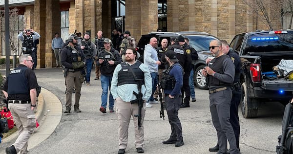 Armed man rammed vehicle into Michigan synagogue, fatally shot by security