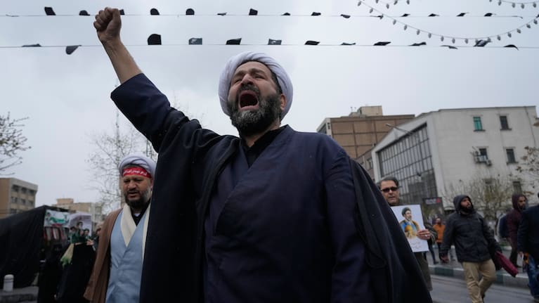 Facade of a building at Dubai's financial district is seen partially damaged which, according to the authorities was caused by falling debris after a successful interception, United Arab Emirates, Friday, March 13, 2026. 
