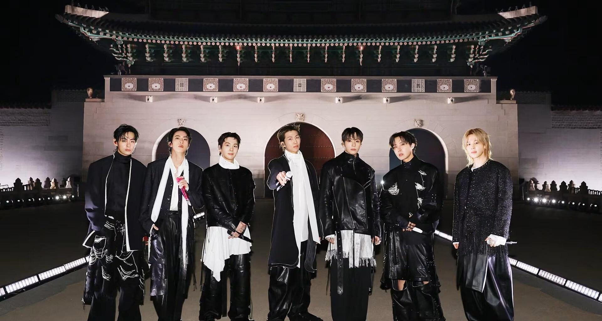 BTS members pose ahead of their comeback performance “BTS COMEBACK LIVE: ARIRANG”at Gwanghwamun Square in Seoul, Saturday. Courtesy of BigHit Music/Netflix