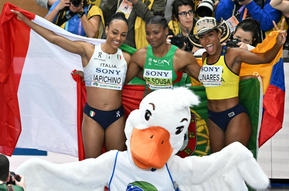 (LtoR) Italy's Larissa Iapichino, Portugal's Agate De Sousa and Colombia's Natalia Linares