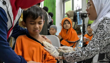 Experts refute 'natural' immunity claims as Indonesia battles measles outbreak