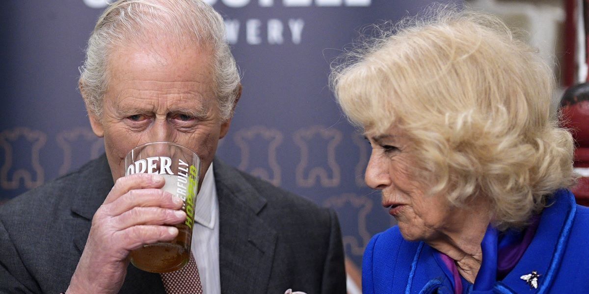 Queen Camilla's repeated attempts to nudge King Charles caught on camera