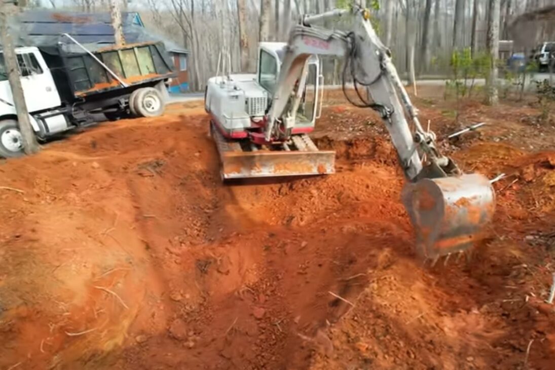 A natural pool with an excavation, waterfall, biological filter, and giant rocks shows how the island has become a bathing area.