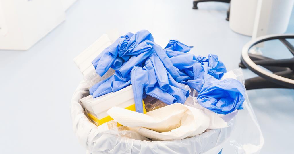 Nitrile rubber gloves upcycled into carbon capture materials