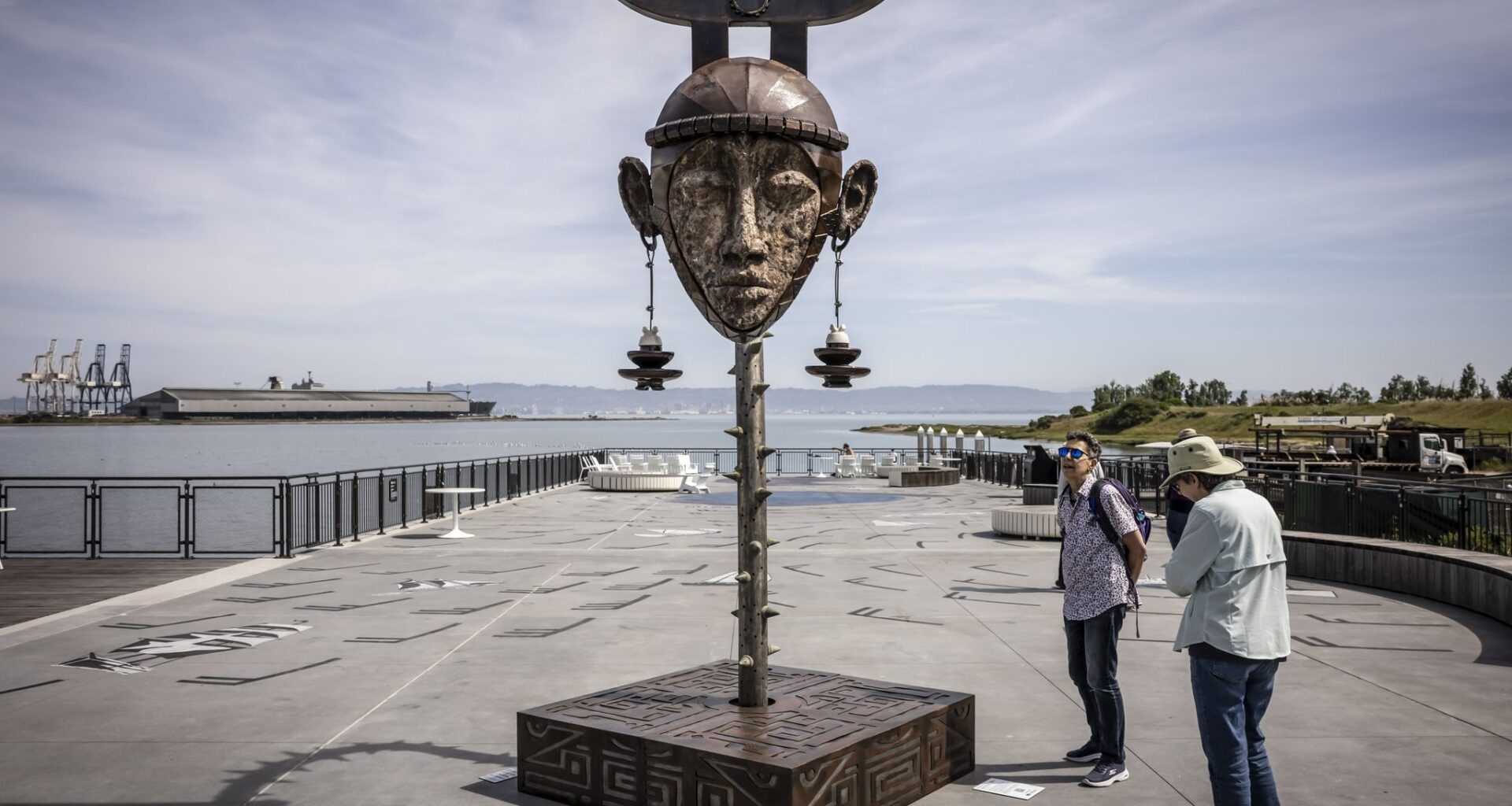 Giant mask sculpture made from industrial scrap turns heads at SF park