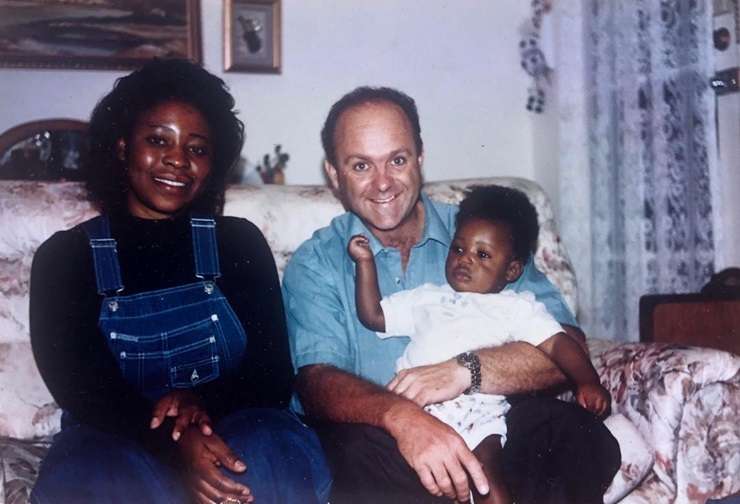 Ray White agent Oscar Jnr Obiaha reconnects with Etienne and Sandy de Haast, the couple who cared for him and his mother. Photo / Supplied