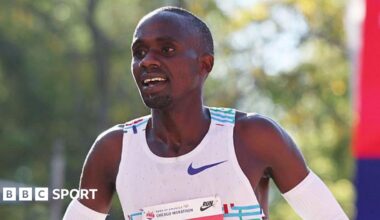 Jacob Kiplimo smiles after winning the Chicago Marathon in 2025