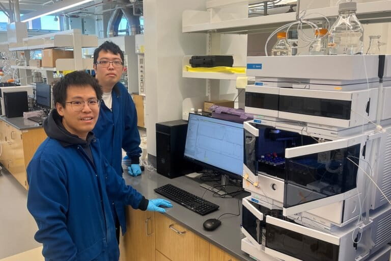 Chemist Yuwei Gu (left) and graduate student Shaozheng Yin used a technique called gel permeation chromatography to track the breakdown of their synthetic polymers during the study.