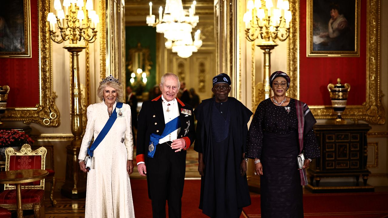 Queen Camilla is resplendent in the Belgian Sapphire Tiara as she joins King Charles at the Nigerian state banquet