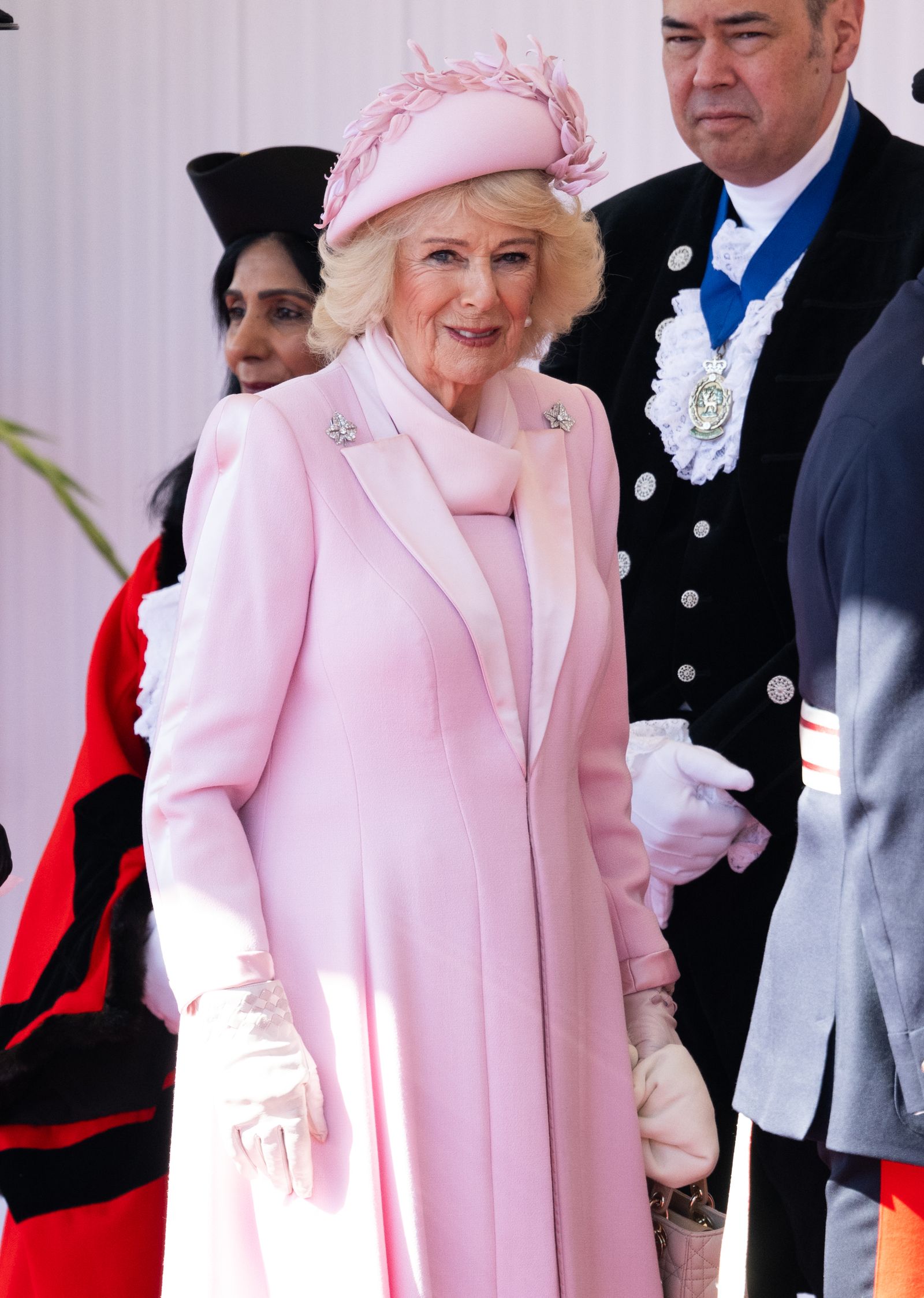 Image may contain Mikhail Muromov Person Adult People Clothing Coat and Glove