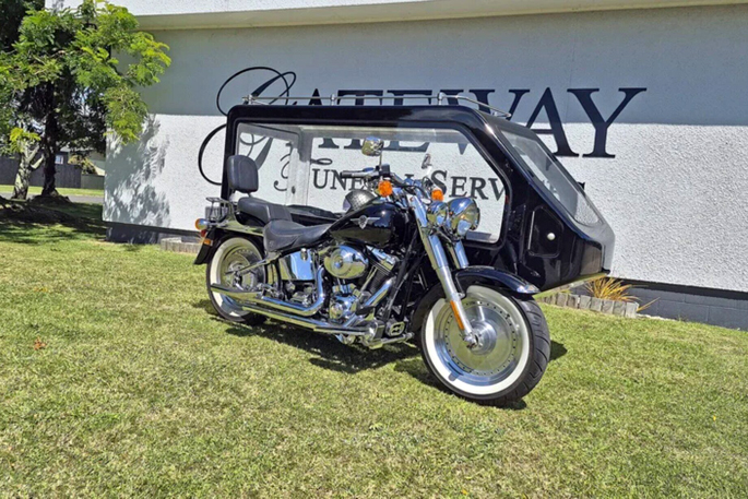 SunLive - Harley hearse offers one last ride in style