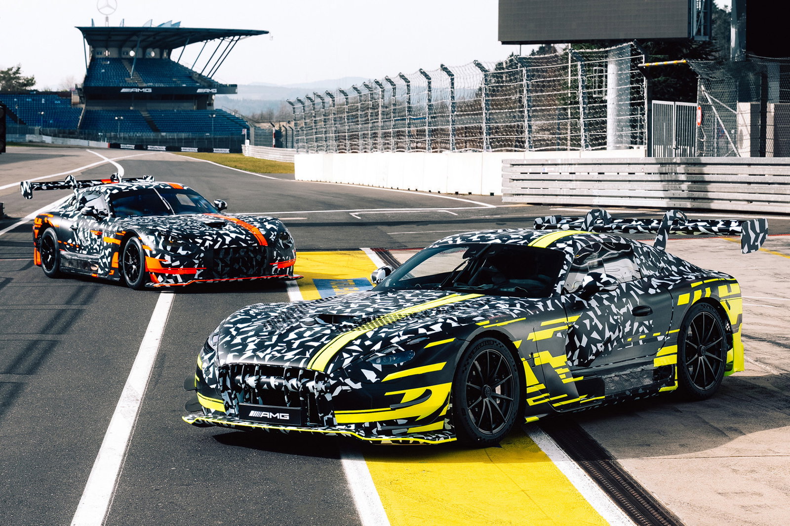 The new Mercedes-AMG GT3 (red stripes) with the new GT Black Series.