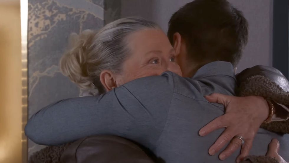 coronation street, bernie and ryan hug, with ryan only seen from behind