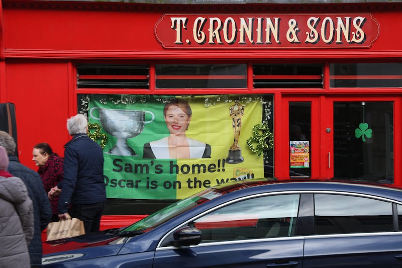 Signs wishing Jessie Buckley luck adorn her home town of Killarney town ahead of Oscars night on Sunday. Photograph: Lina Jevdet/PA Wire